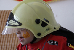 Kind als Feuerwehrmann